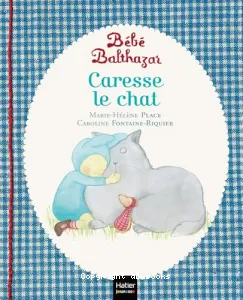 Bébé Balthazar caresse le chat